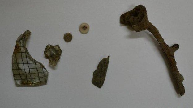 Items supposedly taken at the former Auschwitz death camp by two British schoolboys