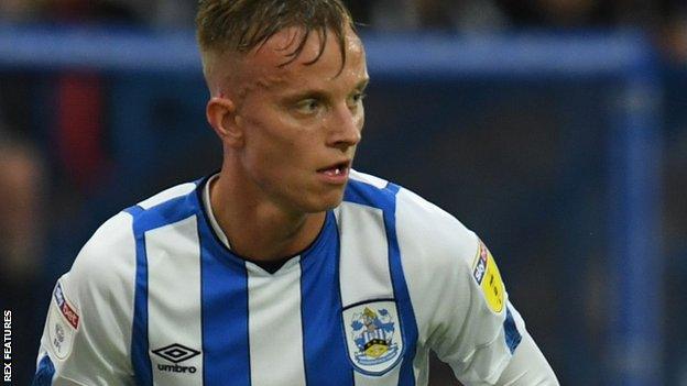 Florent Hadergjonaj playing for Huddersfield Town