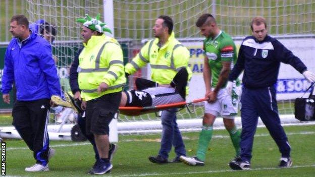 Chris Tardif stretchered off