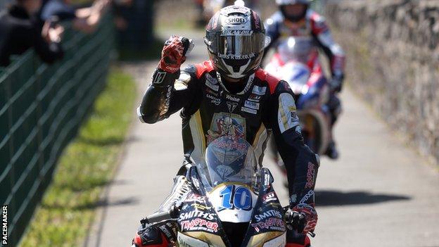 Peter Hickman celebrates after winning Thursday's opener in the Isle of Man