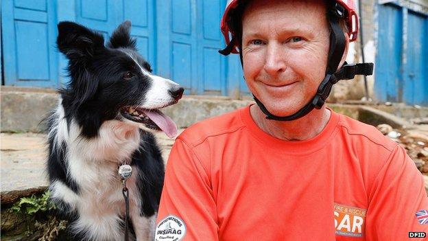 Darcy the dog and handler John Ball