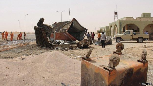 A container damaged in a suicide bomber attack at a checkpoint near Mistrata