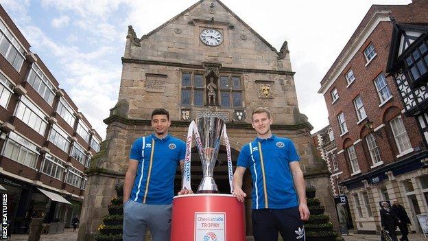 Ben Godfrey and Bryn Morris pose in front of the Old Market Hall, Shrewsbury