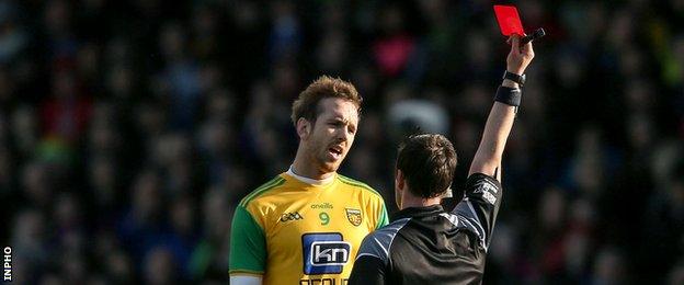 Referee Paddy Neilan sends off Donegal's Nathan Mullins in Killarney