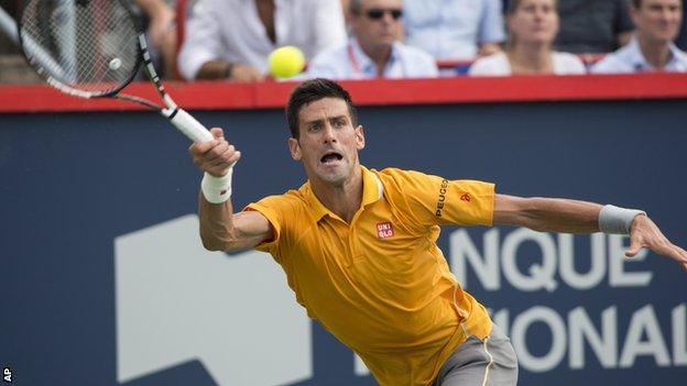 Novak Djokovic plays a forehand