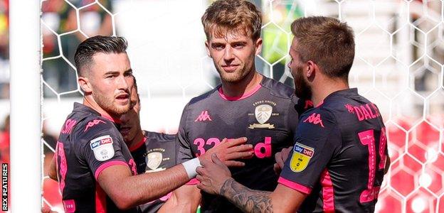 Patrick Bamford (centre) celebrates his goal against Stoke with his Leeds teamamtes