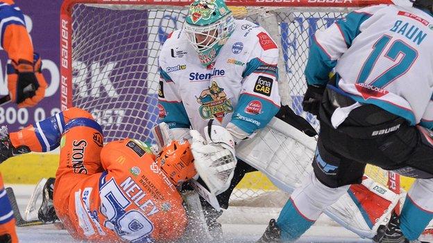Sheffield's Eric Neiley collides with Giants netminder Tyler Beskorowany at the Fly DSA Arena