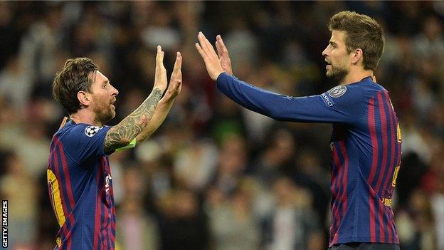 Lionel Messi and Gerard Pique