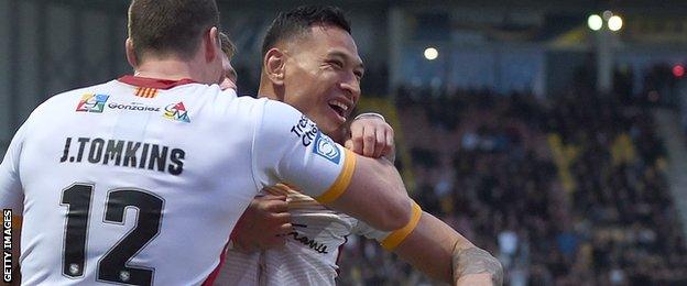 Israel Folau celebrates with his Catalans team-mates