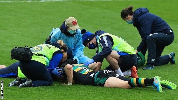 Dan Biggar is treated for a head injury