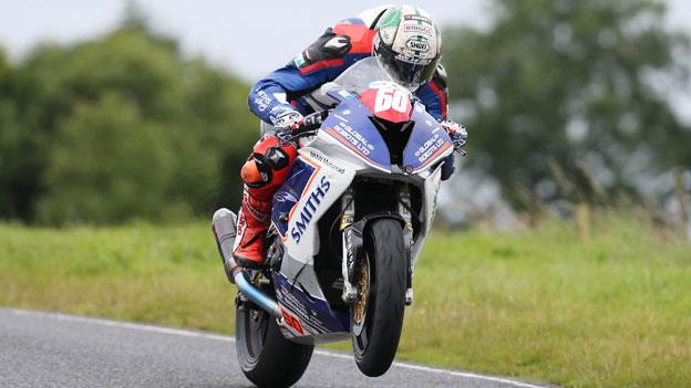 Peter Hickson on the way to winning the opening Superstock race