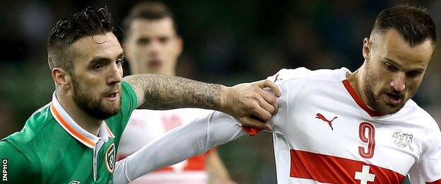 Republic of Ireland's Shane Duffy and Haris Seferovic of Switzerland