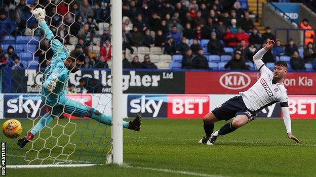 Gary Madine scored in his last match for Bolton to earn a 1-1 draw against Ipswich