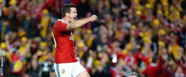 Johnny Sexton celebrates scoring a try for the Lions in 2013