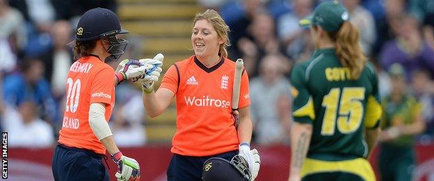 Lydia Greenway and Heather knight celebrate after England win in Cardiff