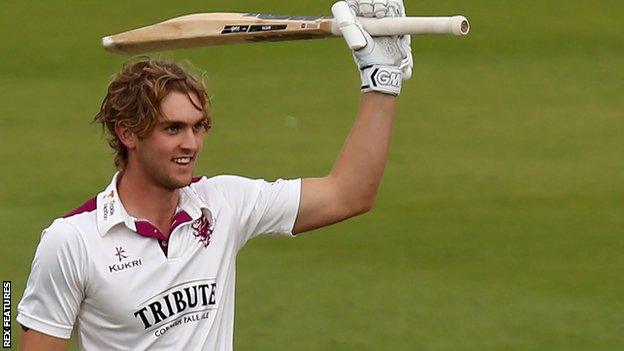 Tom Lammonby raises his bat after reaching his century