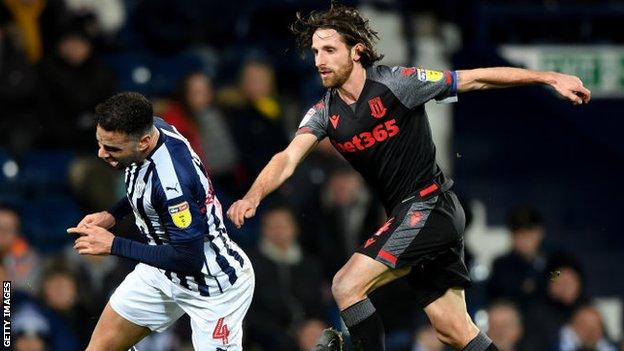 Joe Allen (right) in action against Hal Robson-Kanu