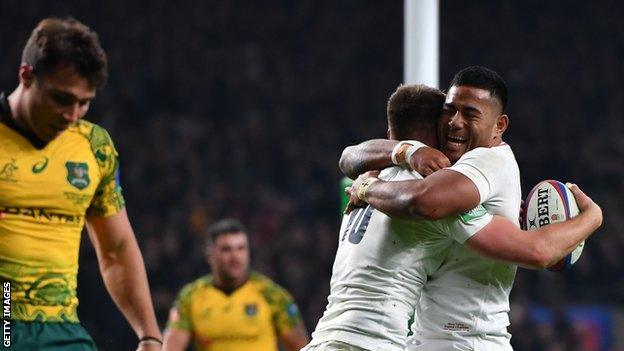 Owen Farrell and Manu Tuilagi hug in celebration