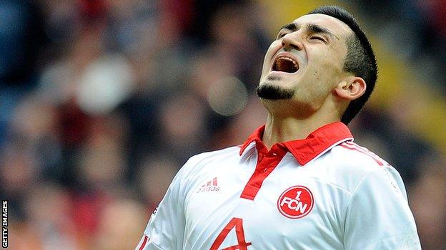 Ilkay Gundogan reacts while playing for Nurnberg