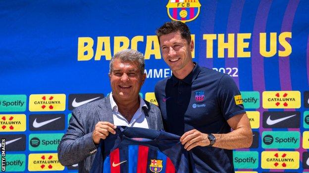 Robert Lewandowski and Barcelona president Joan Laporta