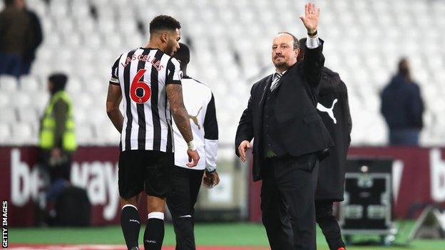 Newcastle boss Rafael Benitez and Jamaal Lascelles (left)