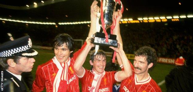 Alan Hansen, Kenny Dalglish and Graham Souness celebrate winning the Milk Cup in 1984