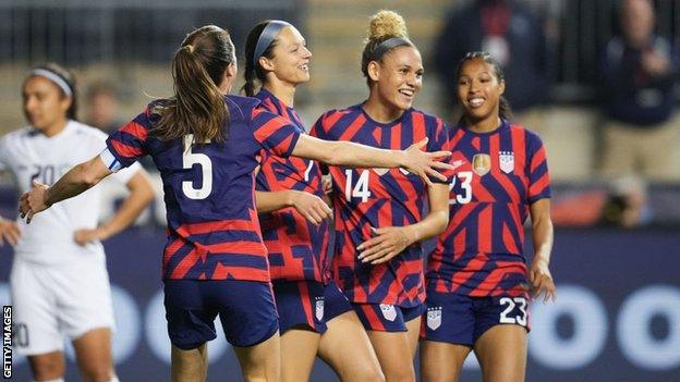 Trinity Rodman celebrates with USA teammates