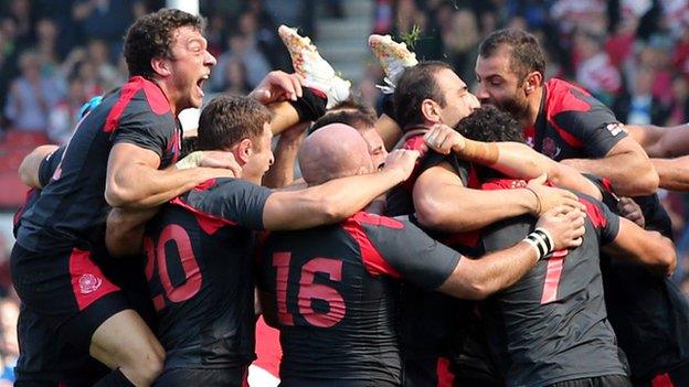 Georgia celebrate their Rugby World Cup win over Tonga