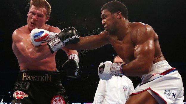 Anthony Joshua catches Alexander Povetkin with a right hand