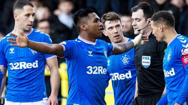 Alfredo Morelos (centre) celebrates his goal