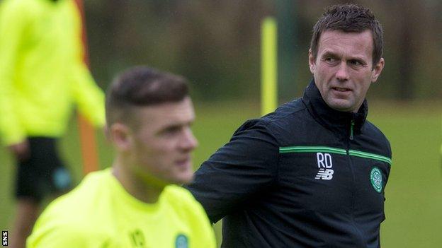 Celtic manager Ronny Deila looks concerned in training