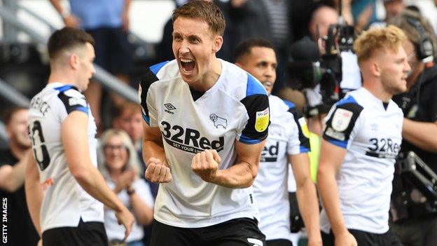 Derby County celebrate their goal against rivals Nottingham Forest