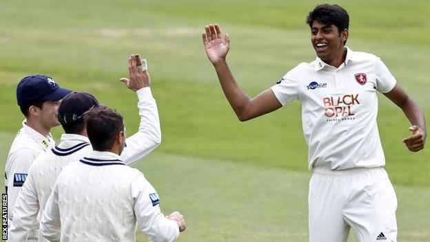 Jas Singh (right) celebrates a wicket for Kent