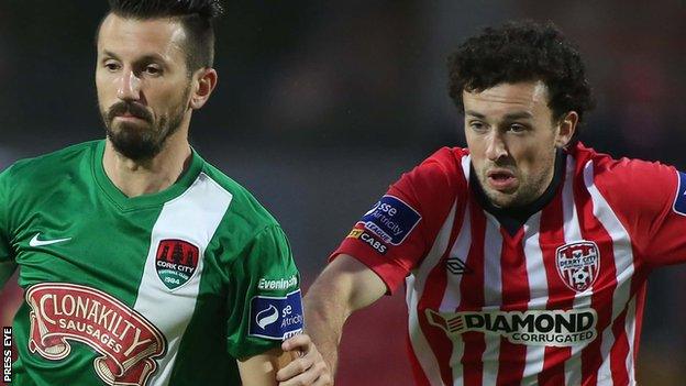 Liam Miller of Cork City in action against Barry McNamee of Derry City