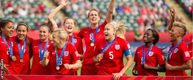 England women celebrate third place at the World Cup