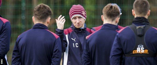 Hearts head coach Ian Cathro talks tactics with his players