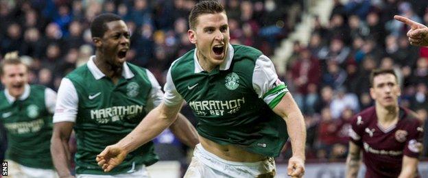 Hibs' Paul Hanlon celebrates after scoring against Hearts