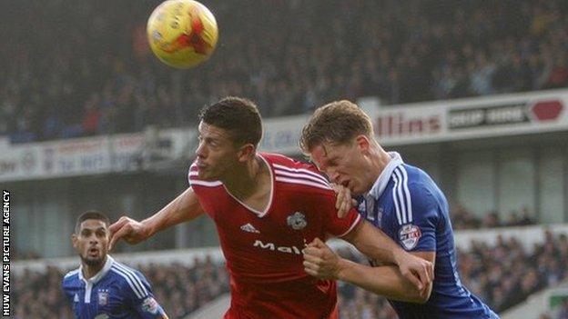 Cardiff striker Alex Revell wins a header in the Ipswich box