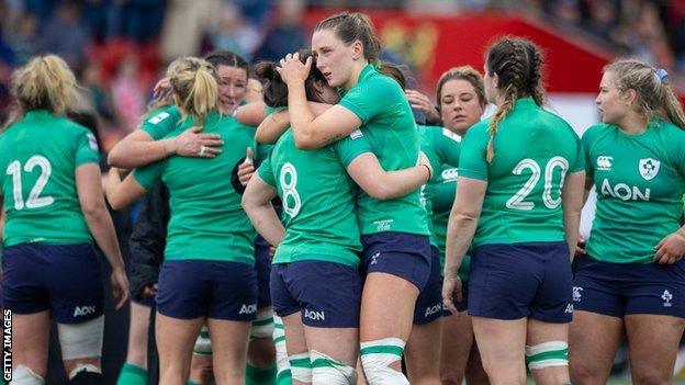 Ireland players after defeat to England