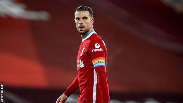 Jordan Henderson wearing a rainbow armband