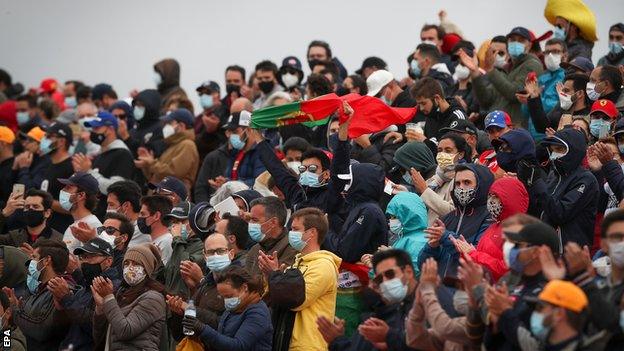 Fans watch the Portuguese Grand Prix