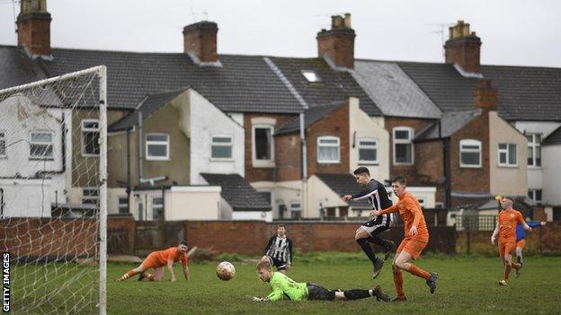 An adult amateur football match