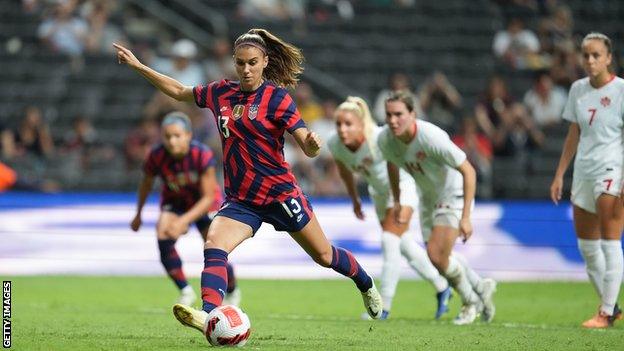 Alex Morgan takes the match-winning penalty