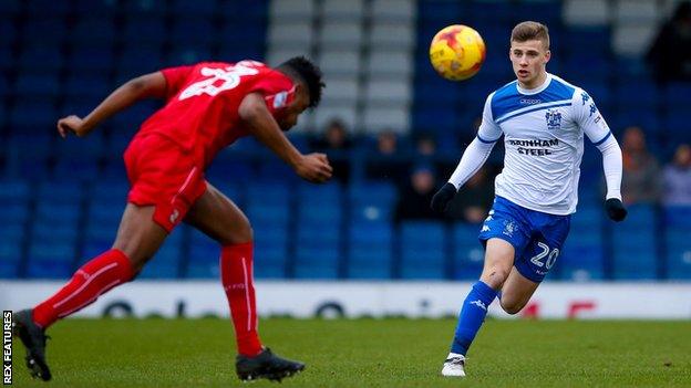 Midfielder Scott Burgess has come through the youth system at Bury