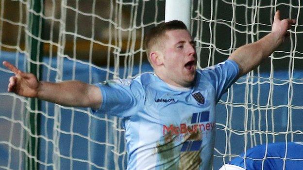 David Cushley celebrates after putting Ballymena 2-1 ahead in the County Antrim Shield Final