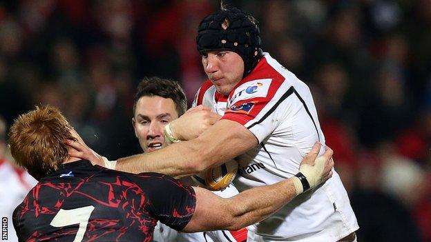 Stephen Ferris hands off Roddy Grant during a game between Ulster and Edinburgh in 2014