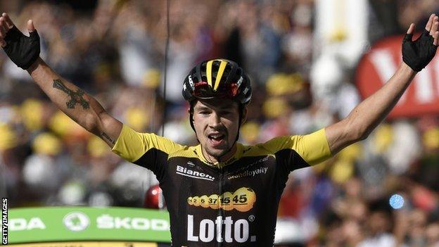 Primoz Roglic celebrates winning stage 17