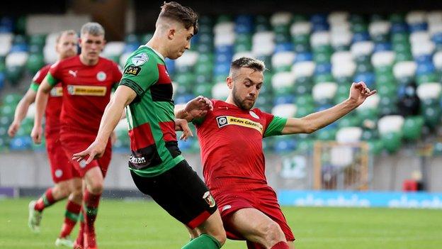 Paul O'Neill challenges Conor McMemamin in last season's Irish Cup semi-final