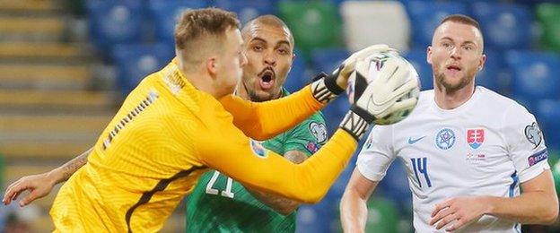 Josh Magennis and Marek Rodak