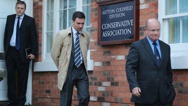 Chris Jones (left), Stuart Hinton (centre) and Ken Mackaill (right) are seen leaving the meeting with Mr Mitchell